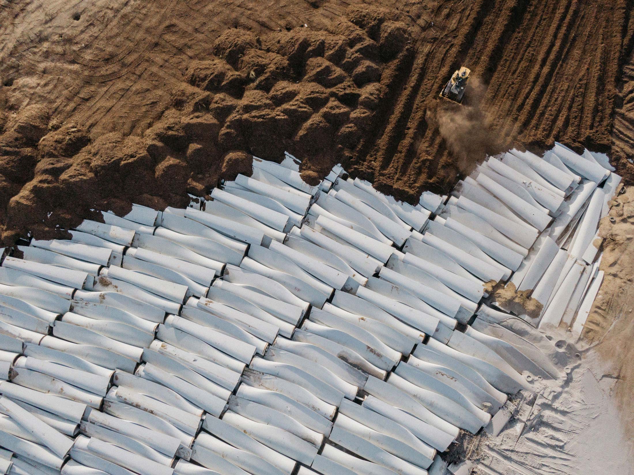 Decommissioned wind-turbine blades in a landfill near Casper, Wyoming